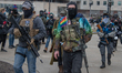 Boogaloo Bois arrive to where National Guard members were sent in to support Michigan Stat...