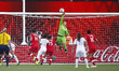 EDMONTON, June 12, 2015 () -- Canada's goalkeeper Erin McLeod (Top) saves a goal during th...