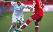 (150612) -- EDMONTON, June 12, 2015 () -- Canada's Sophie Schmidt (R) defends New Zealand'...