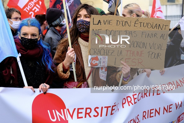 Students take part in a demonstrataion against the government policy, in Paris, France, on January 20, 2021. 