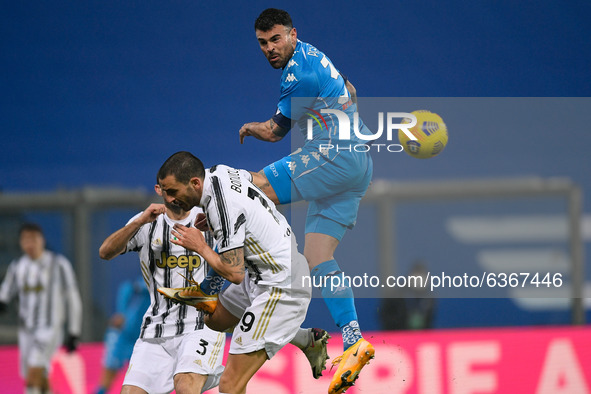 Andrea Petagna of SSC Napoli and Leonardo Bonucci of Juventus FC jump for the ball during the Italian PS5 Supercup Final match between FC Ju...