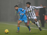 Lorenzo Insigne of SSC Napoli and Juan Cuadrado of Juventus FC compete for the ball during the Italian PS5 Supercup Final match between FC J...