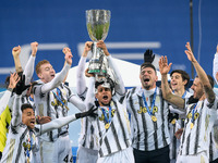 Weston McKennie of Juventus FC and his teammates celebrate after winning the Italian Super Cup Final match between FC Juventus and SSC Napol...