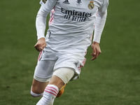 Federico Valverde of Real Madrid runs with the ball during the Supercopa de Espana Semi Final match between Real Madrid and Athletic Club at...
