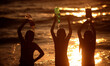 Palestinians enjoy their weekend on a beach along the Mediterranean Sea in Gaza city June...