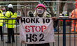 An environmental activist from HS2 Rebellion protests as police carry out an operation to...