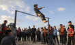 A palestinian boy practice parkour skills on Gaza Beach during sunset, on February 12, 202...