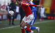 L-R Charlton Athletic's Ben Purrington holds of Olly Lee of Gillingham's (on loan from Hea...