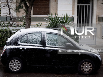 A snow covered a car In Athens, Greece, on February 15, 2021. The snowfall called 'Medea' showed up in the area of Zografou in Athens, Greec...