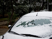 A snow covered a car In Athens, Greece, on February 15, 2021. The snowfall called 'Medea' showed up in the area of Zografou in Athens, Greec...