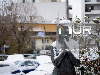 A snow covered sculpture In Athens, Greece, on February 15, 2021. The snowfall called 'Medea' showed up in the area of Zografou in Athens, G...