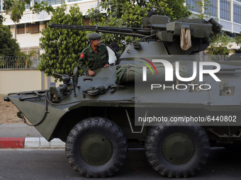 An armoured vehicle is seen during a demonstration against the military coup outside the Central Bank in Yangon, Myanmar on February 15, 202...