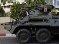 An armoured vehicle is seen during a demonstration against the military coup outside the Central Bank in Yangon, Myanmar on February 15, 202...