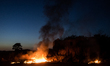 This photo taken on September 9, 2019 shows a toxic fire in Villa Ricca (Naples), between...