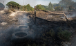 This photo taken on September 15, 2019 shows the remnants of a toxic fire in Villa Literno...