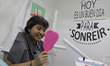 A minor is seen in the mirror after the end of a dental session during the health emergenc...