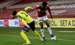 Middlesbrough's Marc Bola in action with Huddersfield Town's Pipa during the Sky Bet Champ...