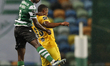 Nuno Mendes and Fahd Moufi in the air during the game for Liga NOS between Sporting CP and...