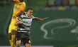 Joo Palhinha and an opponent in the air during the game for Liga NOS between Sporting CP a...