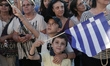 People demonstrate outside the Greek Parliament in favor of Euro and European Union at Syn...