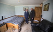 The Prince of Wales meets Paul Card in his flat  during a visit to Ham Close in Richmond t...