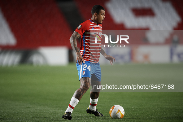 Kenedy of Granada runs with the ball during the UEFA Europa League Round of 32 match between Granada CF and SSC Napoli at Estadio Nuevo los...