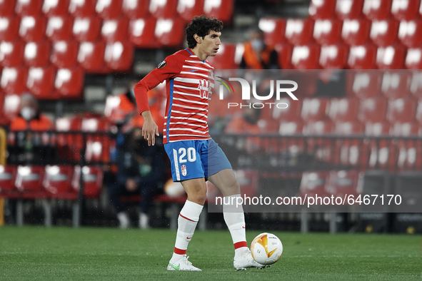 Jesus Vallejo of Granada controls the ball during the UEFA Europa League Round of 32 match between Granada CF and SSC Napoli at Estadio Nuev...
