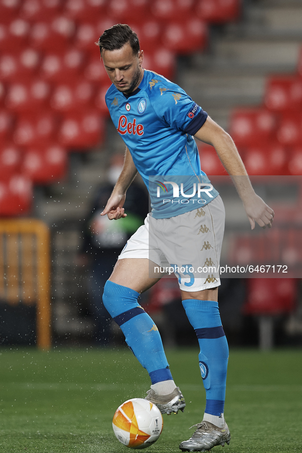 Amir Rrahmani of Napoli controls the ball during the UEFA Europa League Round of 32 match between Granada CF and SSC Napoli at Estadio Nuevo...