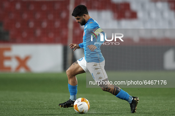 Lorenzo Insigne of Napoli runs with the ball during the UEFA Europa League Round of 32 match between Granada CF and SSC Napoli at Estadio Nu...