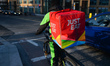A JUST EAT courier waiting on a traffic light in Dublin during Level 5 Covid-19  lockdown....
