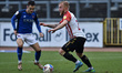 Oldham Athletic's Marcel Hilssner tussles with Joe Riley of Carlisle United during the Sky...