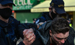 An Anti-Lockdown protester arrested by Gardai during clashes in Grafton Street, Dublin, du...