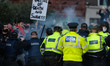 A group of Anti-Lockdown protesters clash with Gardai (Irish Police) in Grafton Street, Du...