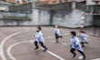 Several primary school students run in one of the courtyards of the Nuestra Señora de Cova...