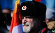 Man with Soviet's Red Army Coat of Arms hat attends the celebrations of the National Holid...
