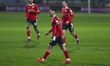  Barnsleys Alex Mowatt scores direct from a free kick and celebrates with team mates durin...