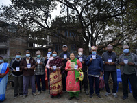 Nepalese People above 65 shows vaccination card after getting first dose of COVID19 vaccines developed by Oxford- AstraZeneca Plc at Bal Kum...