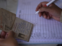 A Health worker arrange the list of the Nepalese People above 65 to gets first dose of COVID19 vaccines developed by Oxford- AstraZeneca Plc...
