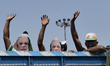 Activists shout slogans, carries a cut out of India's Prime Minister Narendra Modi, placar...