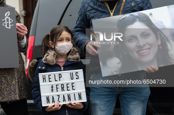 LONDON, UNITED KINGDOM - MARCH 08, 2021: Richard Ratcliffe's daughter Gabriella (6) takes part in a protest outside the Embassy of Iran in L...