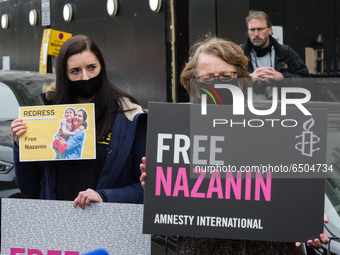 LONDON, UNITED KINGDOM - MARCH 08, 2021: Amnesty International activists protest outside the Embassy of Iran in London for an immediate rele...