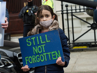 LONDON, UNITED KINGDOM - MARCH 08, 2021: Richard Ratcliffe's daughter Gabriella (6) takes part in a protest outside the Embassy of Iran in L...