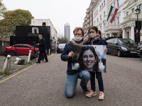 LONDON, UNITED KINGDOM - MARCH 08, 2021: Richard Ratcliffe and his daughter Gabriella (6) protest outside the Embassy of Iran in London call...