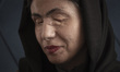 Masoumeh Ataei, who is a victim of an acid attack sits at her apartment in the Parand-town...