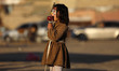 A Palestinian girl eats cotton candy on the beach in Gaza City on March 17, 2021. 