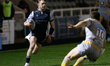 Tom Penny of Newcastle Falcons makes a searing break to offload to George Wacokecoke of Ne...