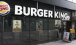 A Glovo courier enters a Burger King fast food restaurant in Warsaw, Poland on March 20, 2...
