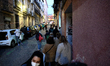 Distribution of hot meals by the local association`Plaza solidaria´ to people without reso...
