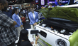 People look at GWN ORA Black Cat Electric cars during at the 42nd Bangkok International Mo...
