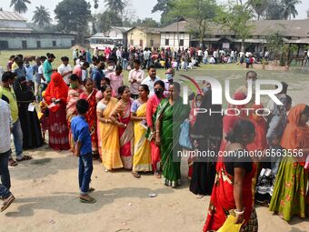oters wait in queue to cast their ballots at a polling station during Phase 1 of Assam's legislative election in Nagaon district, in the nor... by Anuwar Hazarika/NurPhoto